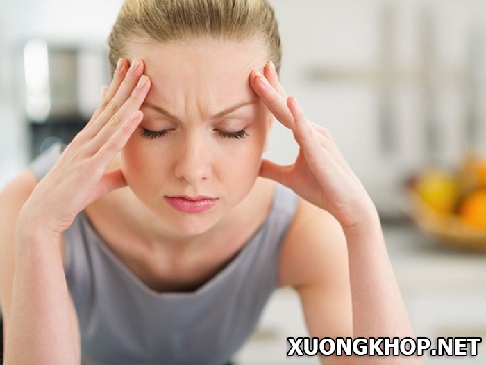 Nhức đầu, đau chân - Triệu chứng không thể xem thường của bệnh vôi hóa cột sống 1
